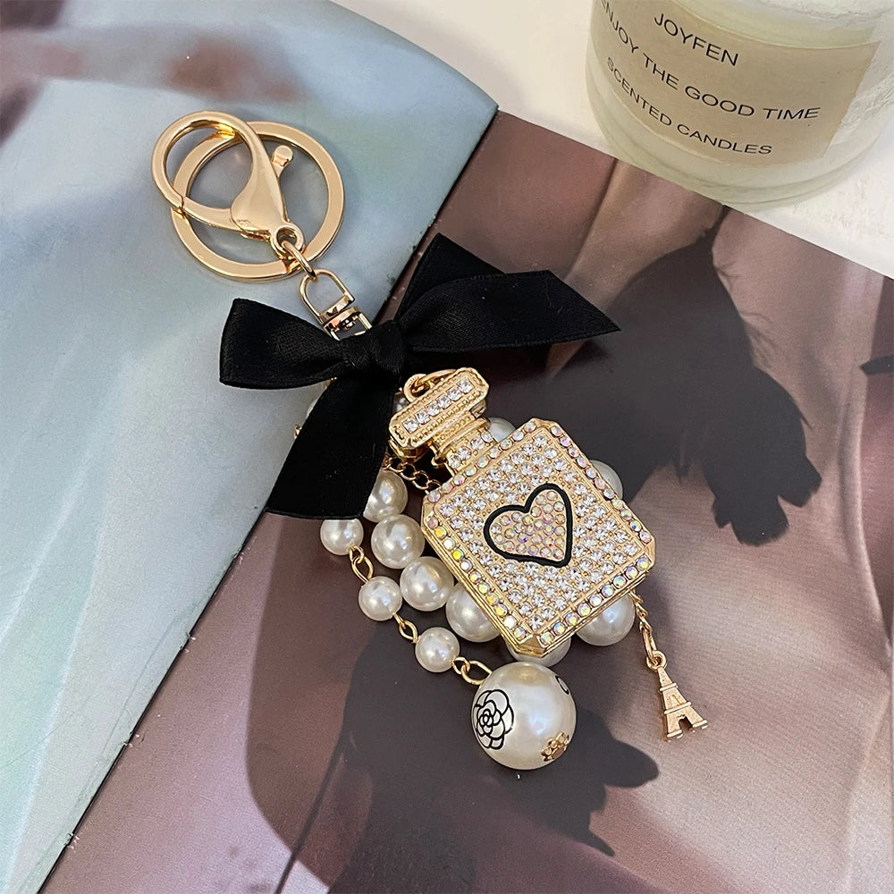 2024 New Luxury Crystal Love Perfume Bottle Keychain Pearl Bow Key Ring Eiffel Tower Women's Bag Pendant Souvenir Gift