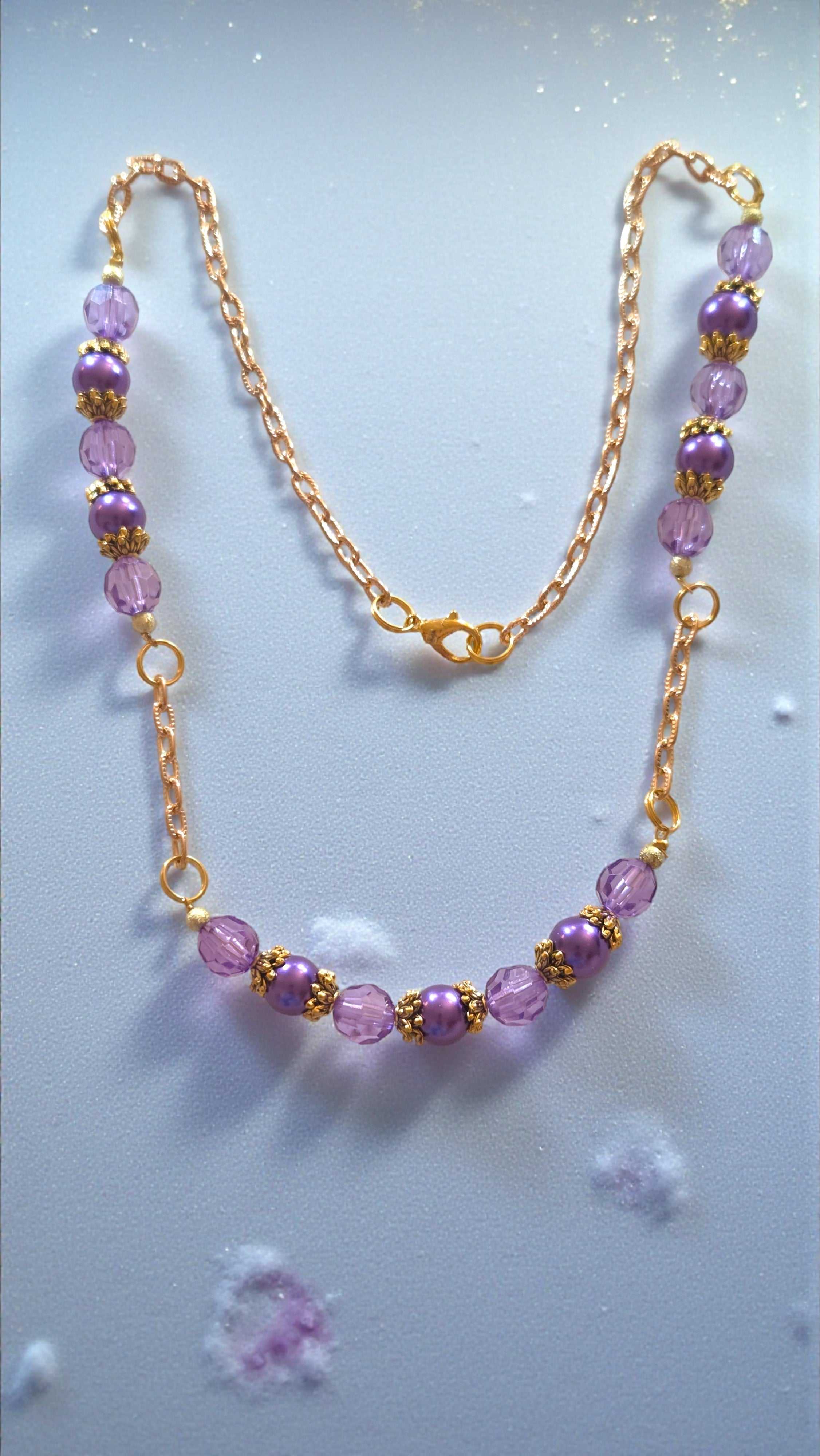 Purple bead necklace with acrylic and glass pearl beads, gold tone caps and chain, 23.5-inch length