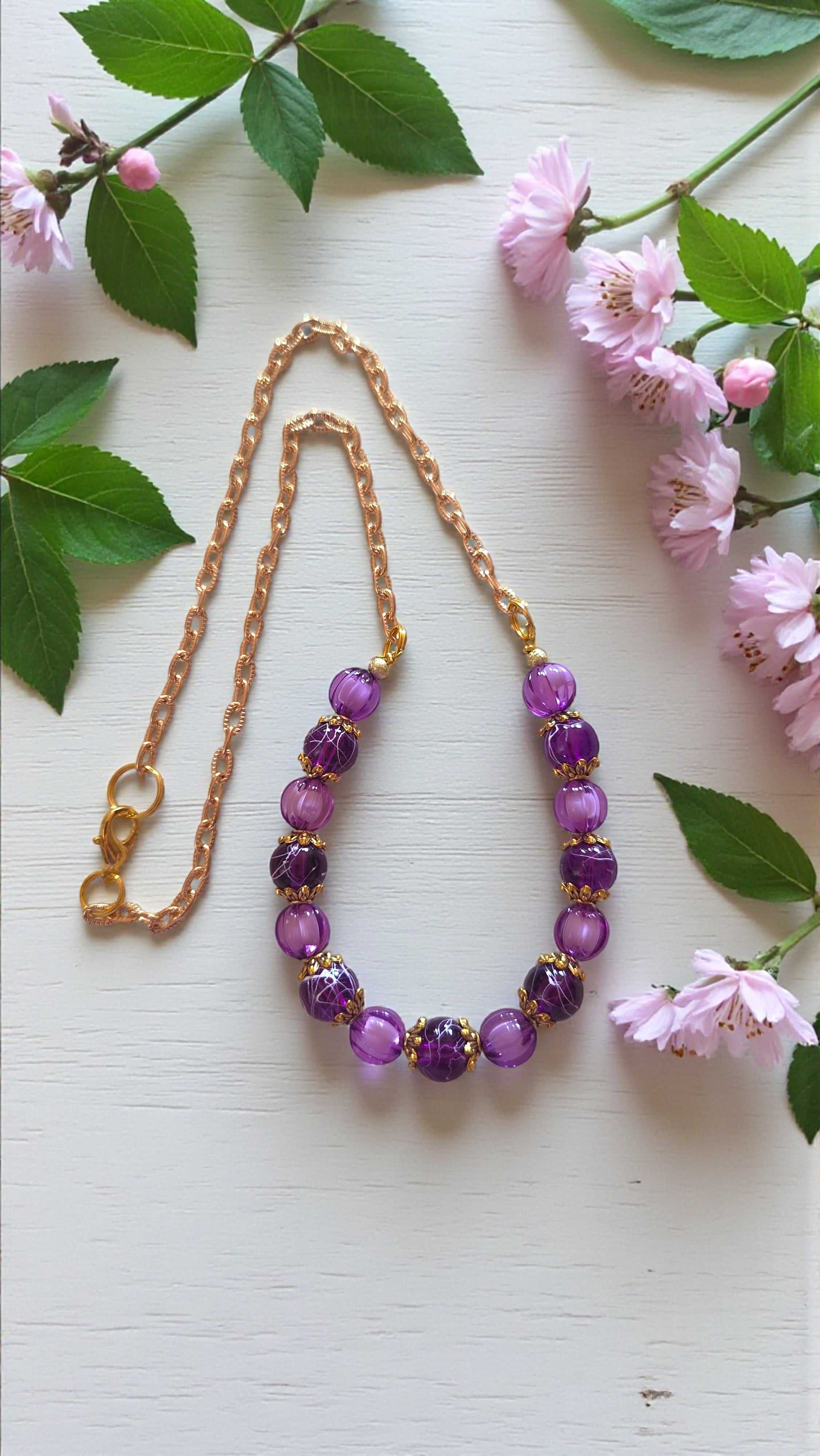 Purple bead necklace with acrylic watermelon beads, glass beads, and gold tone chain