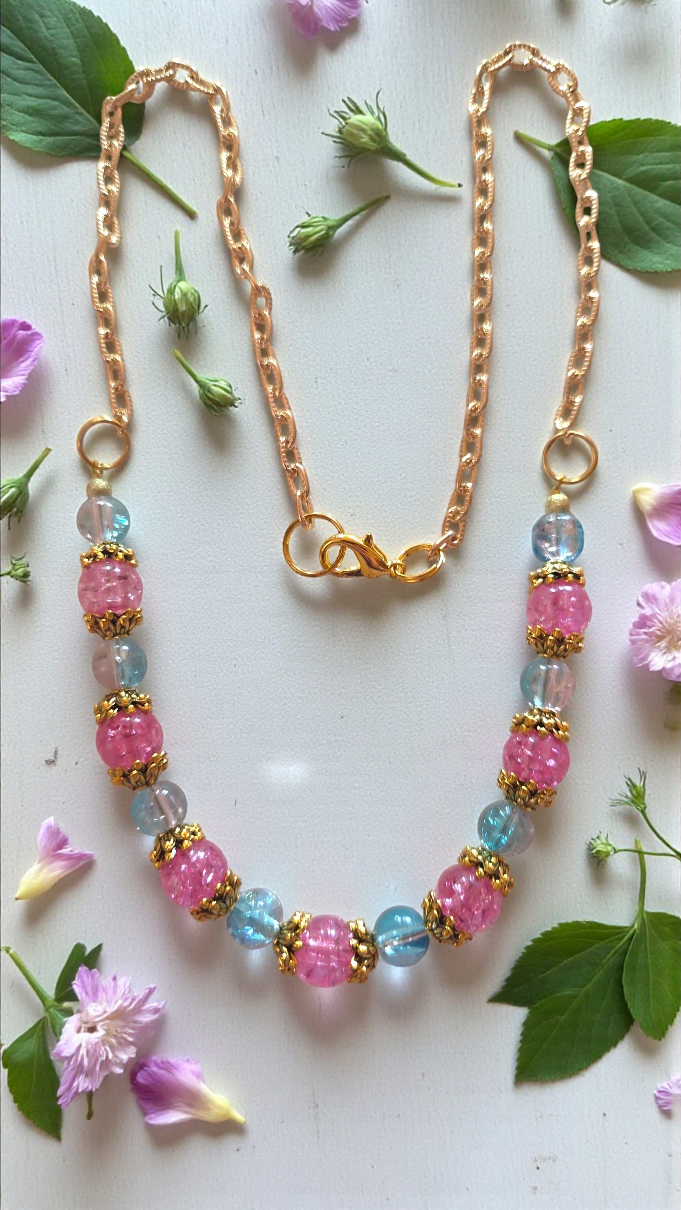 Pink and turquoise bead necklace with gold tone chain and lobster clasp