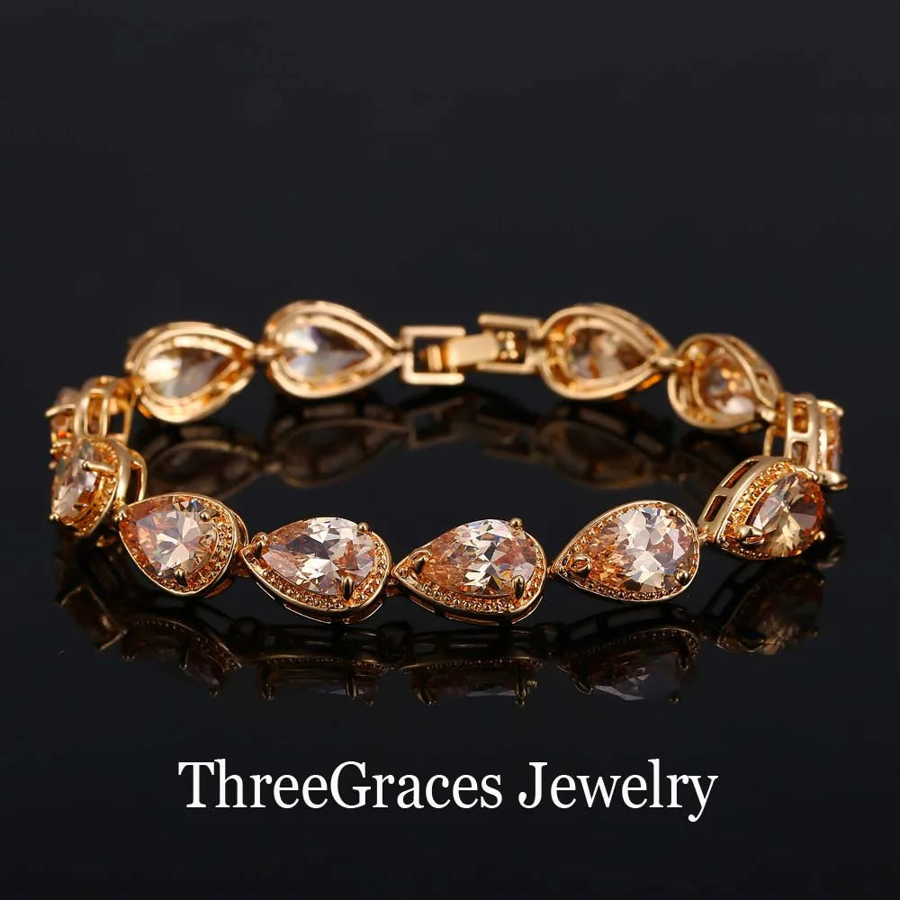 ThreeGraces Fashion Shiny Purple Water Drop Cubic Zirconia Crystal Bridal Wedding Party Bracelet for Women Jewelry BR053