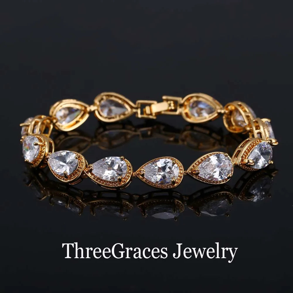 ThreeGraces Fashion Shiny Purple Water Drop Cubic Zirconia Crystal Bridal Wedding Party Bracelet for Women Jewelry BR053