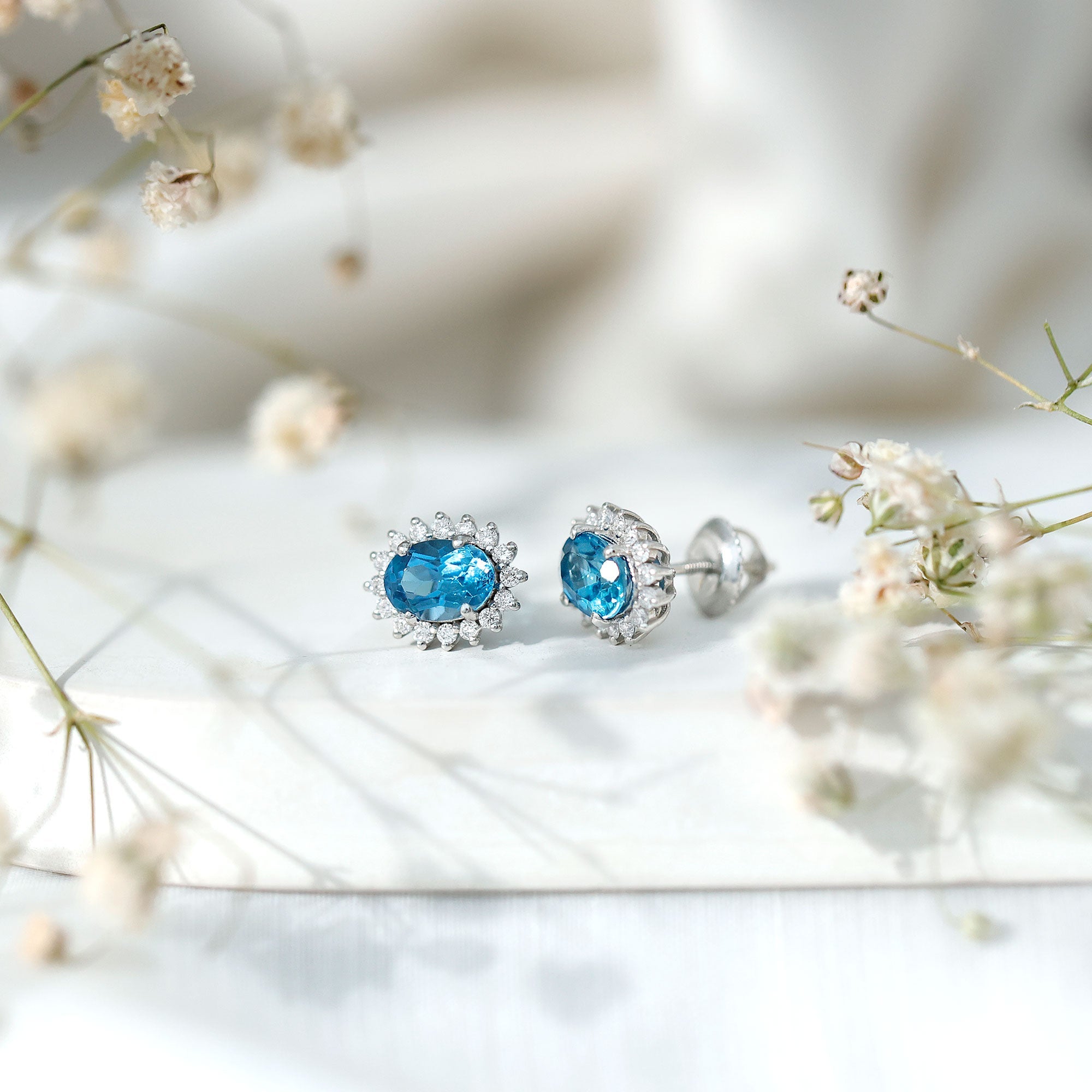 1.6 Carat Oval London Blue Topaz Stud Earrings with Diamond Halo - Sugar & Spice