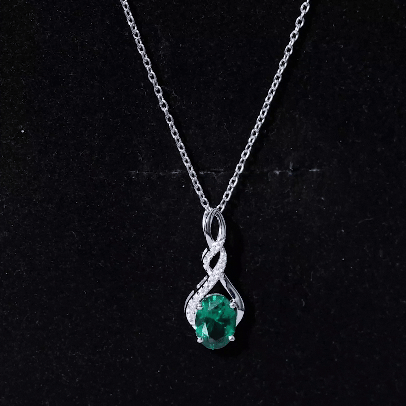 1.25 Carat Lab Grown Emerald Infinity Necklace with Silver Chain - Sugar & Spice