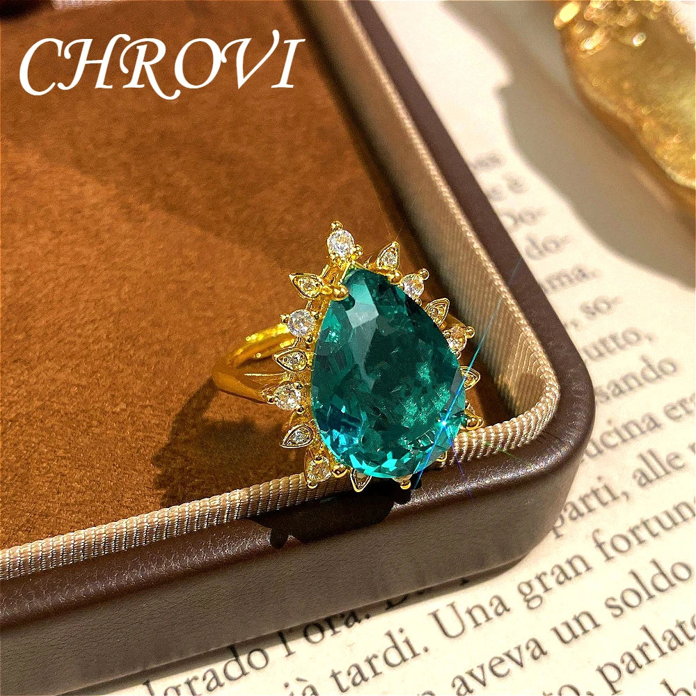 Fashionable and exquisite golden luxury gemstone drop-shaped pendant necklace, women's set including ring, earrings and pendant.