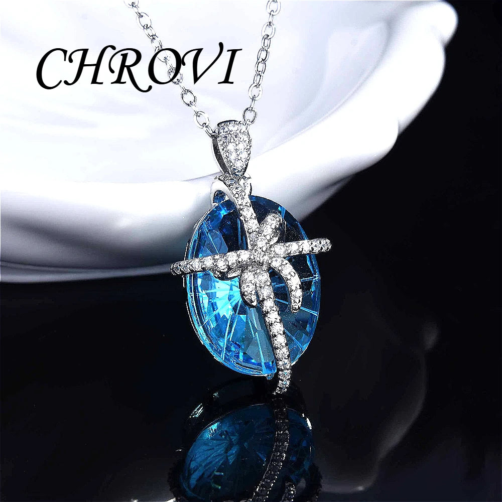 Luxury 925 sterling silver bow-shaped open ring. Exquisite candy-style aquamarine necklace with precious stones.