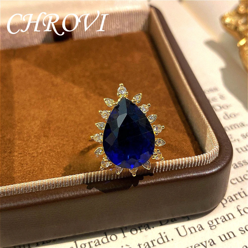 Fashionable and exquisite golden luxury gemstone drop-shaped pendant necklace, women's set including ring, earrings and pendant.