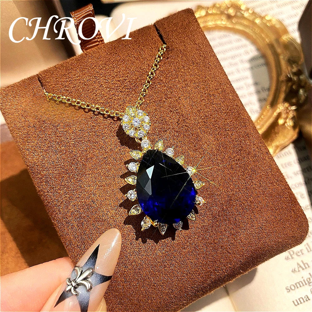 Fashionable and exquisite golden luxury gemstone drop-shaped pendant necklace, women's set including ring, earrings and pendant.