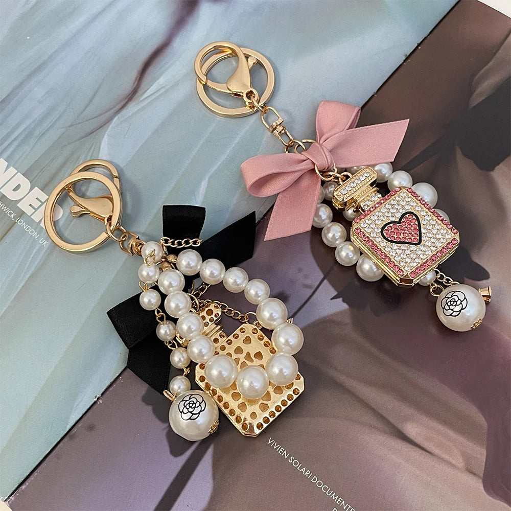 2024 New Luxury Crystal Love Perfume Bottle Keychain Pearl Bow Key Ring Eiffel Tower Women's Bag Pendant Souvenir Gift