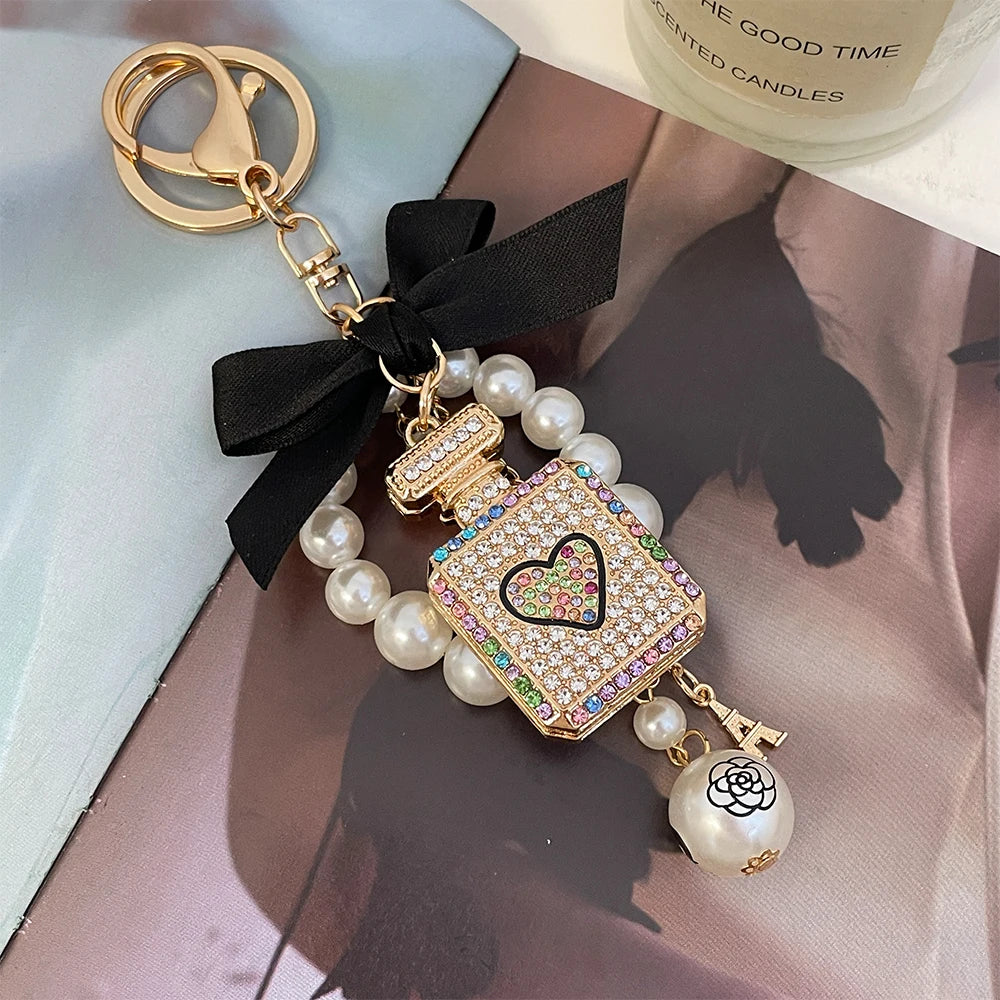 2024 New Luxury Crystal Love Perfume Bottle Keychain Pearl Bow Key Ring Eiffel Tower Women's Bag Pendant Souvenir Gift