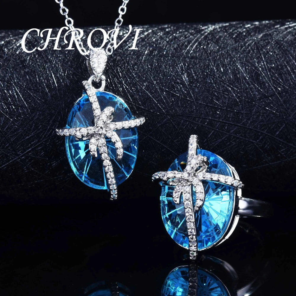Luxury 925 sterling silver bow-shaped open ring. Exquisite candy-style aquamarine necklace with precious stones.