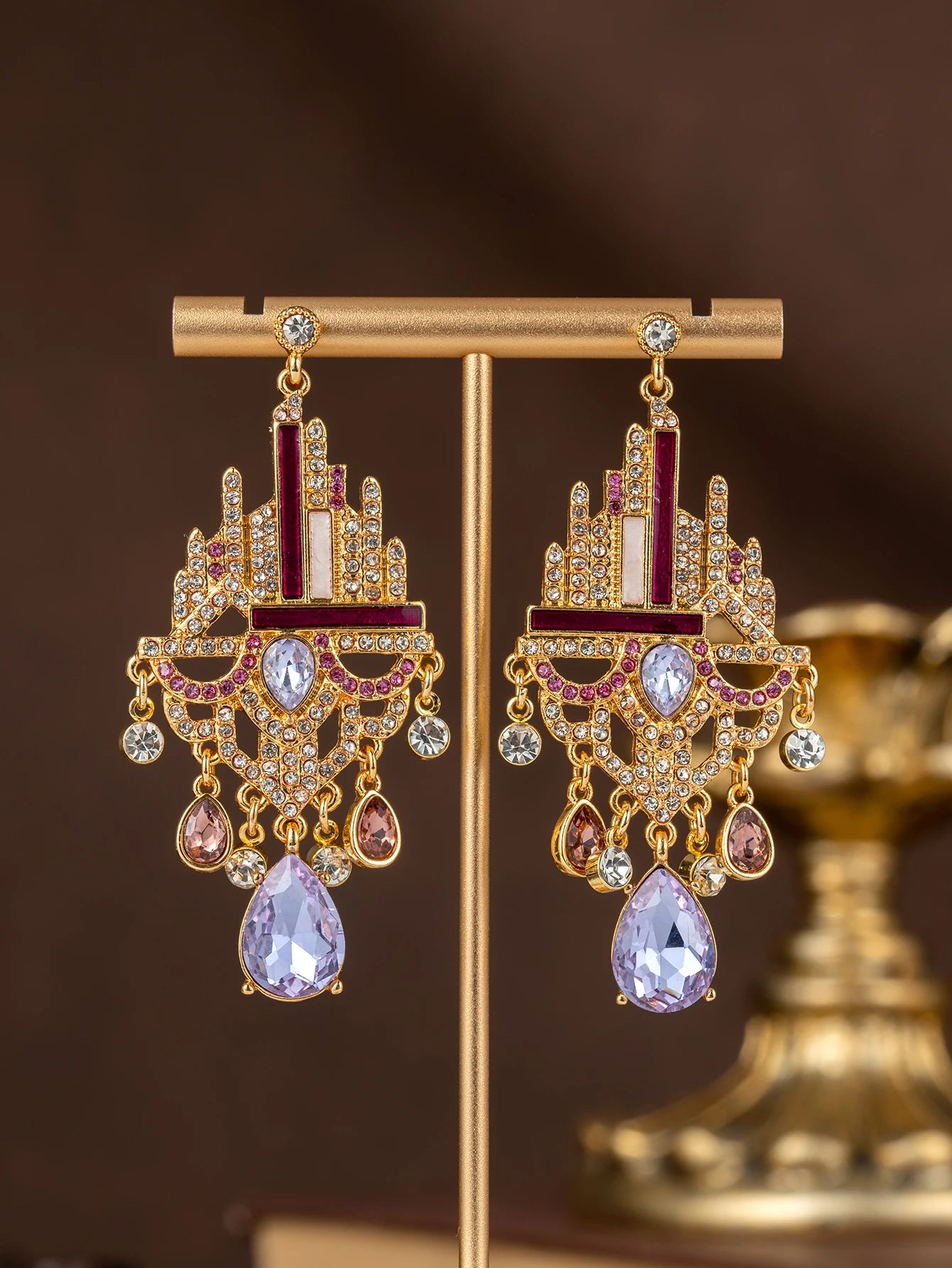 A Pair of Fashionable Ancient Castle-Style Heavy-Duty Tassel Earrings with Purple Diamond, Rose Red Enamel, and Full Diamond Teardrop Gemstones, Suitable as Court Banquet Dress Accessories and Gifts