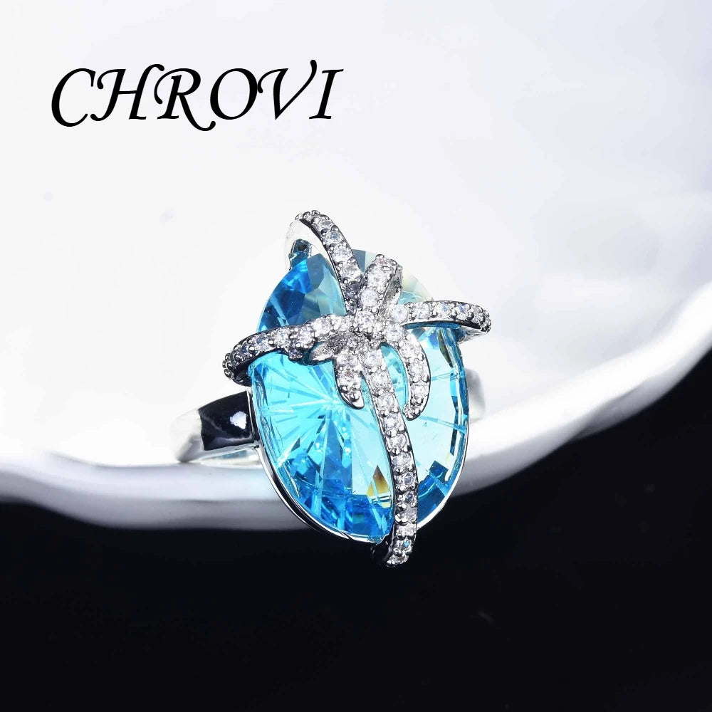 Luxury 925 sterling silver bow-shaped open ring. Exquisite candy-style aquamarine necklace with precious stones.
