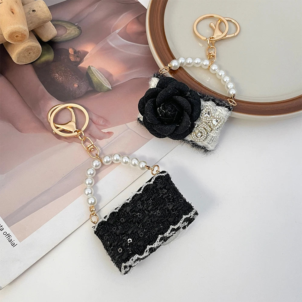 Camellia Keychain Luxury Crystal Bow Pearl Chain Black and White Flower Women's Bag Pendant Handbag Key Ring