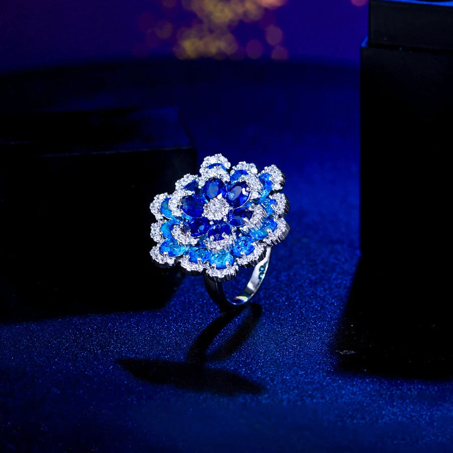 ThreeGraces Elegant Shiny Blue Zirconia 3D Design Big Flower Open Size Ring for Women Luxury Bridal Wedding Party Jewelry R325