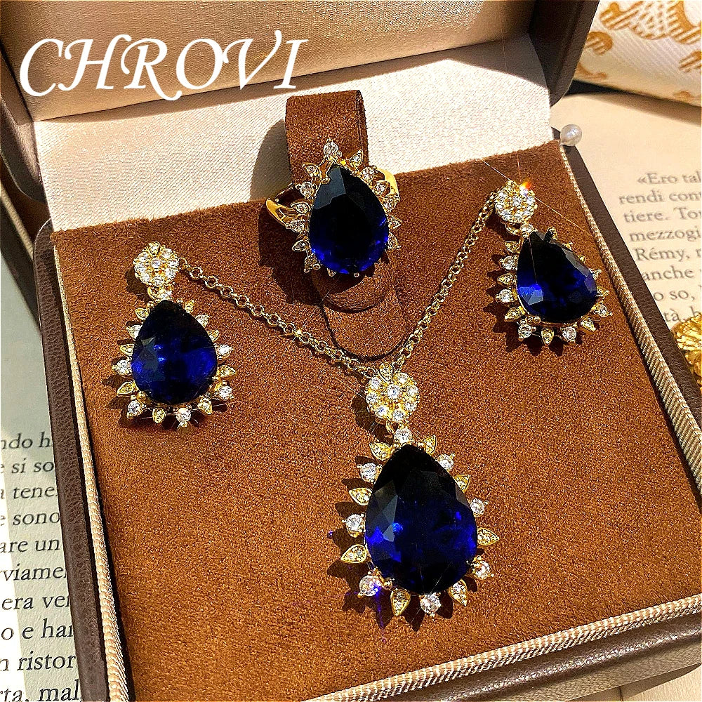 Fashionable and exquisite golden luxury gemstone drop-shaped pendant necklace, women's set including ring, earrings and pendant.