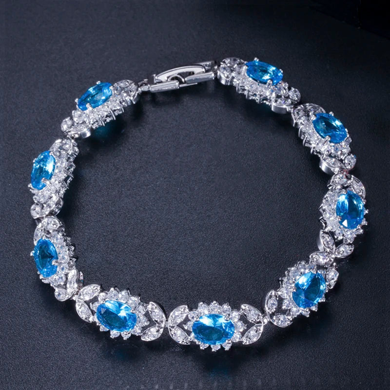 ThreeGraces Delicate Royal Blue Cubic Zirconia Flower Shape Tennis Bracelet for Women Wedding Engagement Costume Jewelry BR196