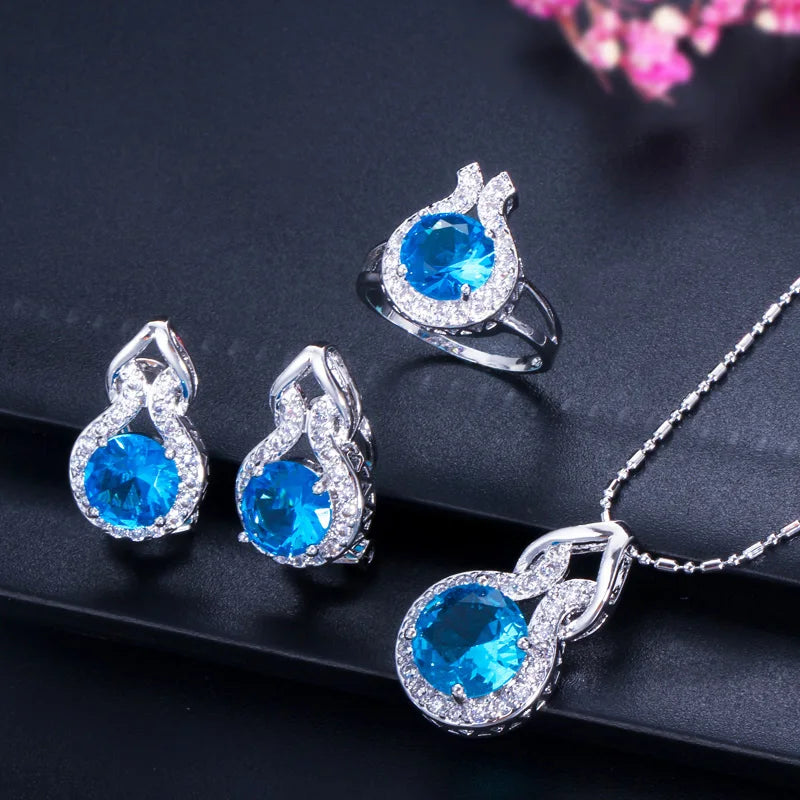 ThreeGraces 3pcs Fashion Shiny Pink Round Zirconia Wedding Party Pendant Necklace and Earrings Ring Jewelry Set for Women T1222