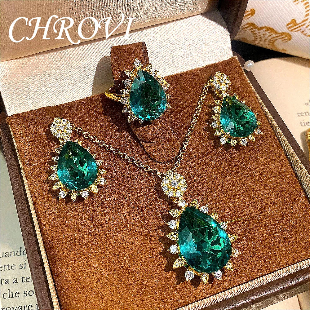 Fashionable and exquisite golden luxury gemstone drop-shaped pendant necklace, women's set including ring, earrings and pendant.