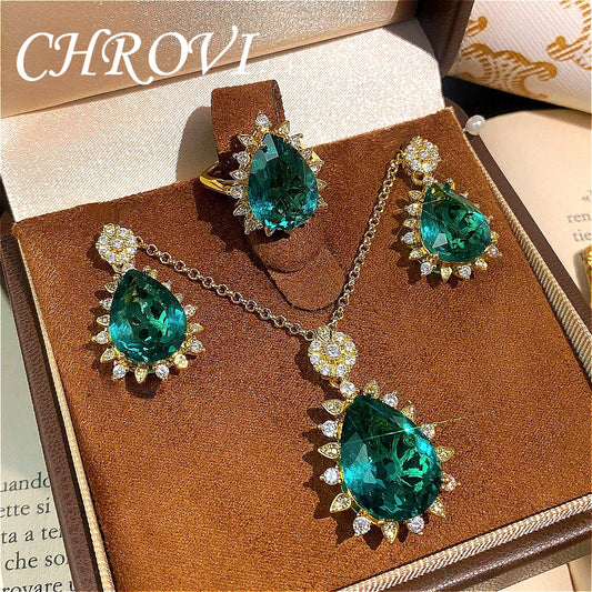 Fashionable and exquisite golden luxury gemstone drop-shaped pendant necklace, women's set including ring, earrings and pendant.