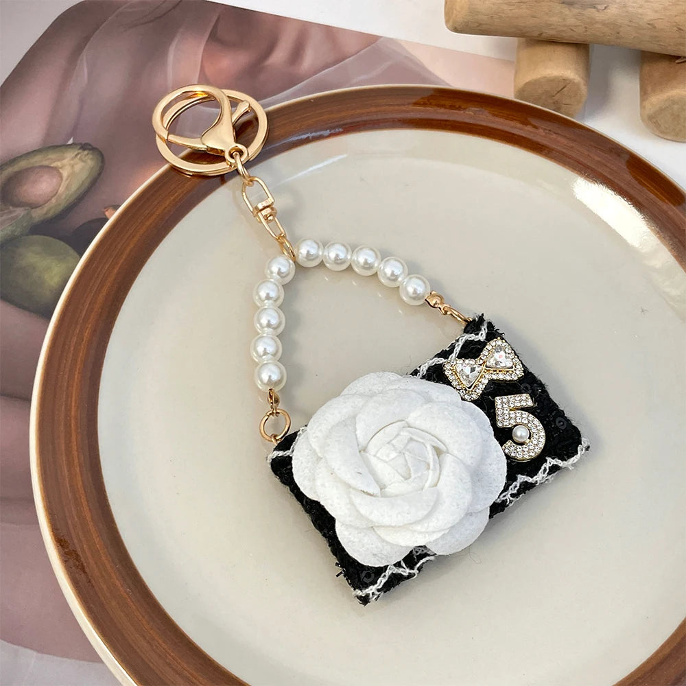 Camellia Keychain Luxury Crystal Bow Pearl Chain Black and White Flower Women's Bag Pendant Handbag Key Ring