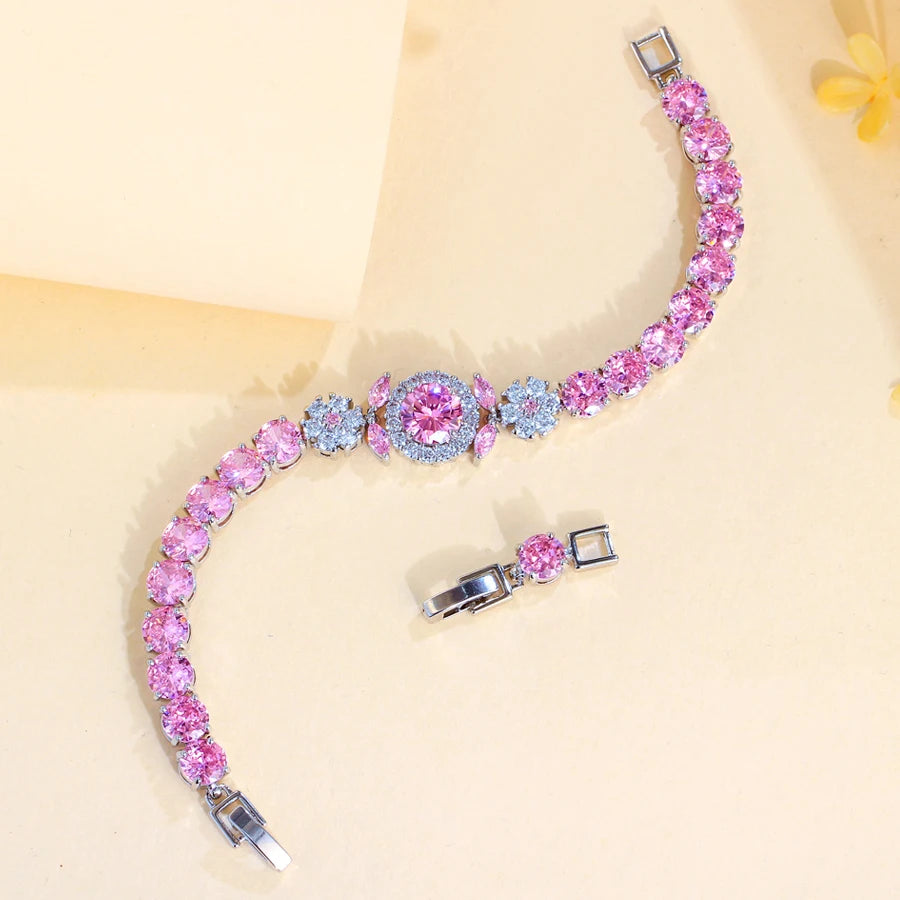 ThreeGraces Elegant Shiny Pink Round Zirconia Fashion Flower Bridal Wedding Engagement Tennis Bracelet for Women Jewelry BR411