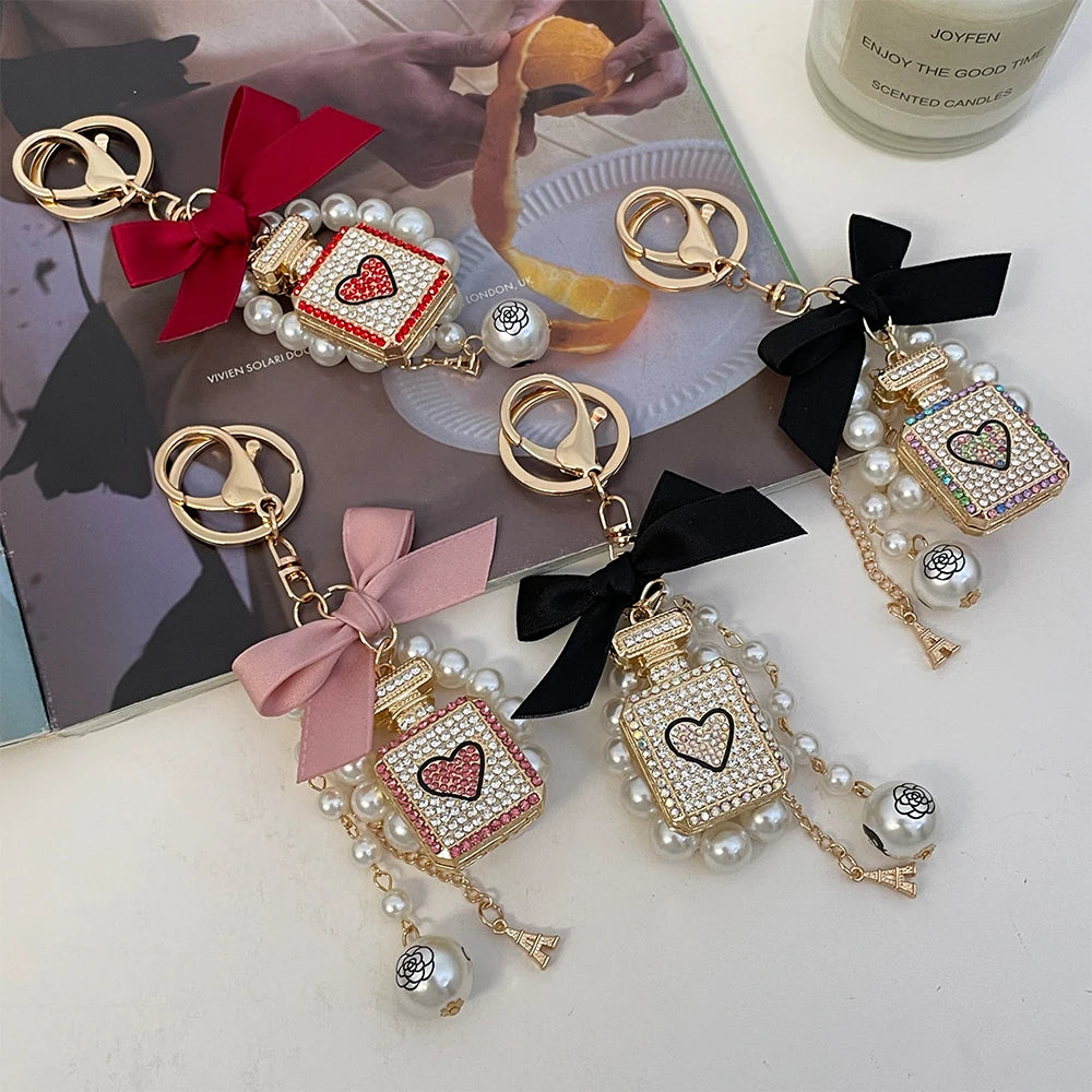 2024 New Luxury Crystal Love Perfume Bottle Keychain Pearl Bow Key Ring Eiffel Tower Women's Bag Pendant Souvenir Gift