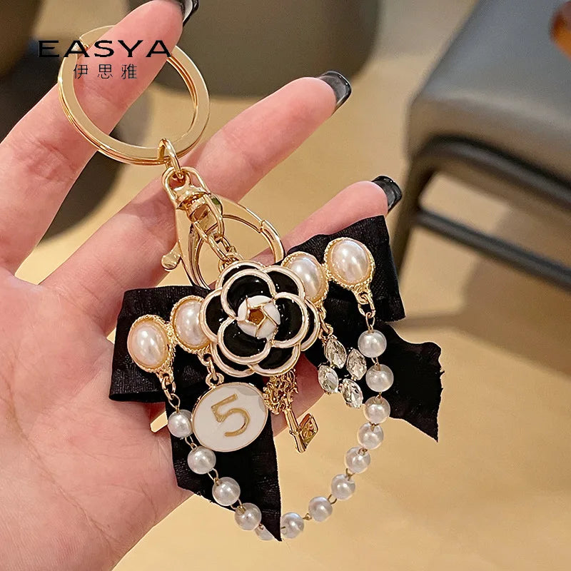 Luxury woman jewelry Pearl alloy bag pendant keychains ring bow tie pendant keychain accessories Key Chain for bags