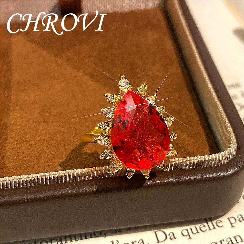 Fashionable and exquisite golden luxury gemstone drop-shaped pendant necklace, women's set including ring, earrings and pendant.