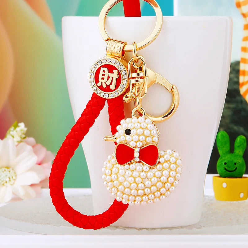 Creative rhinestone cute big yellow duck car keychain women's bag pendant metal key chain ring festival gift wholesale