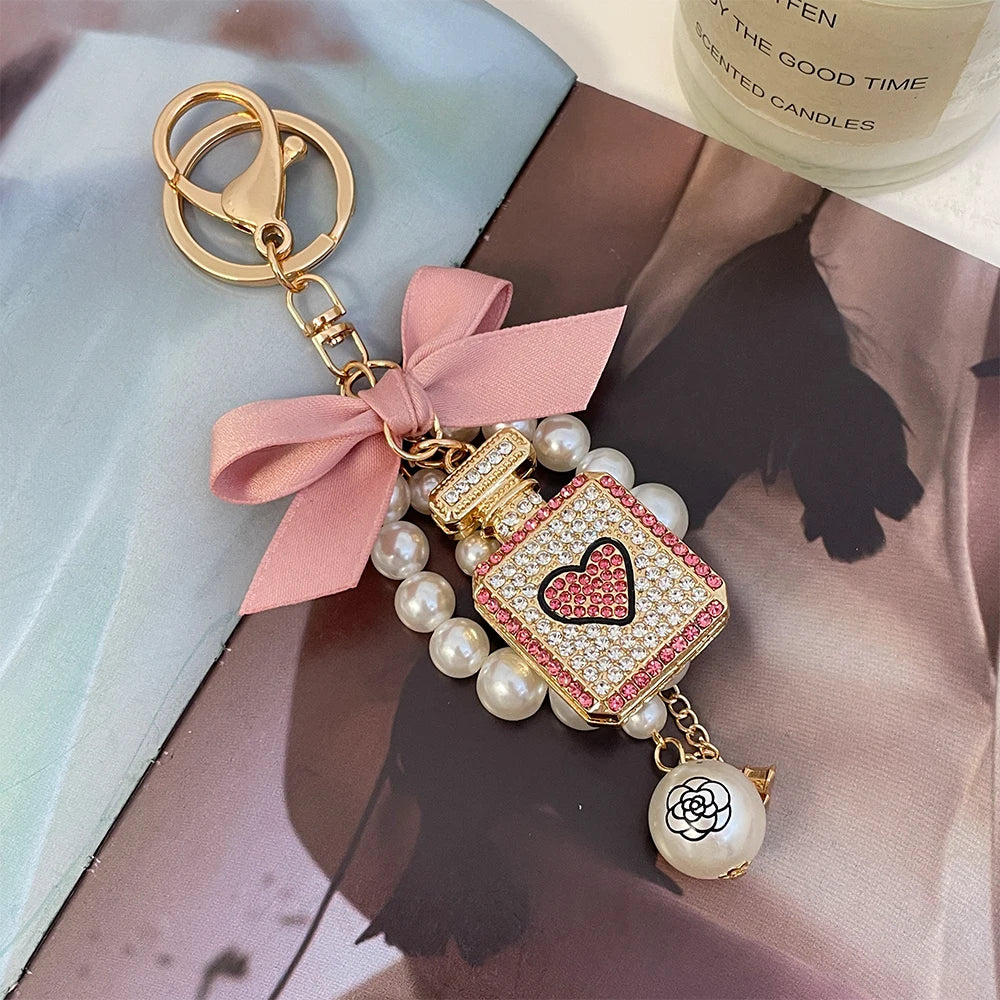 2024 New Luxury Crystal Love Perfume Bottle Keychain Pearl Bow Key Ring Eiffel Tower Women's Bag Pendant Souvenir Gift