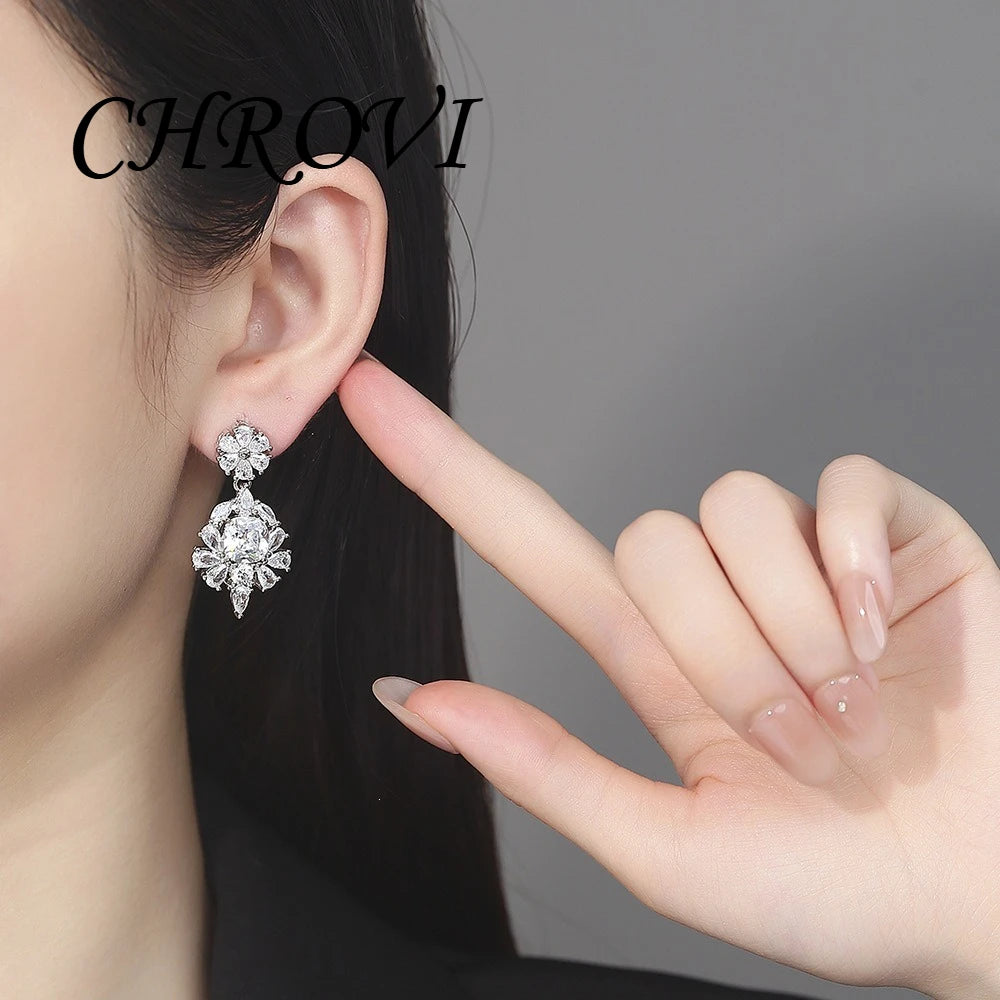 Quality 925 sterling silver chrysanthemum-shaped sugar cube with zircon and fashionable luxurious diamond stud earrings