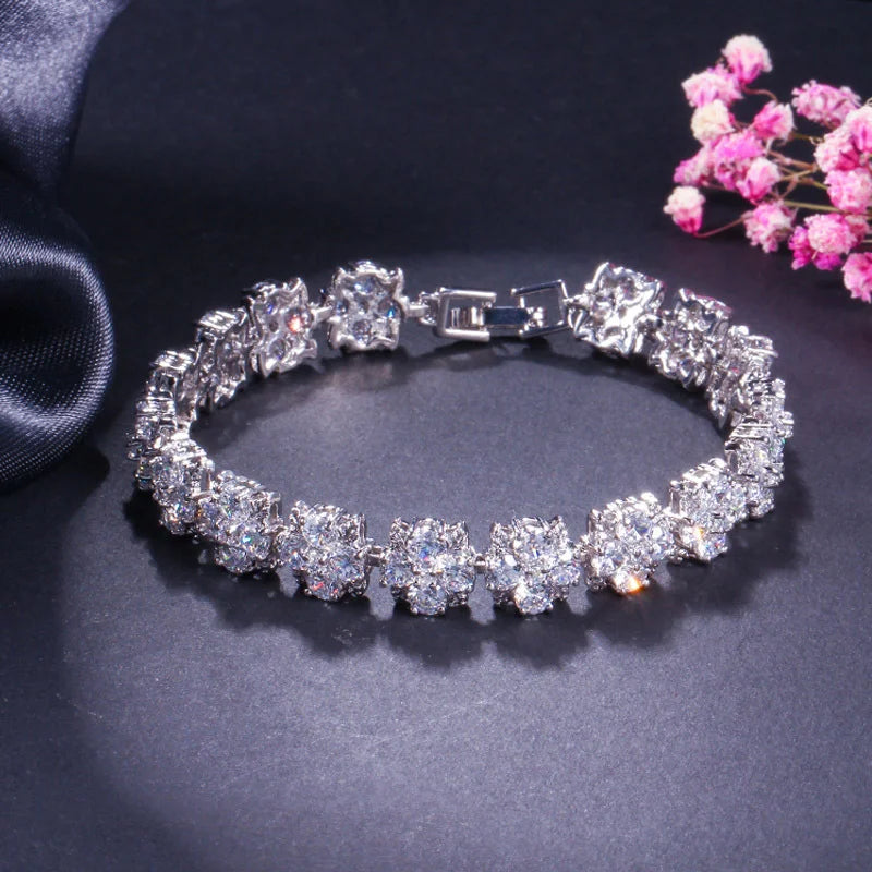 ThreeGraces Luxury Shiny Blue Zirconia Flower Tennis Bracelet for Women Fashion Bridal Wedding Evening Party Jewelry BR402