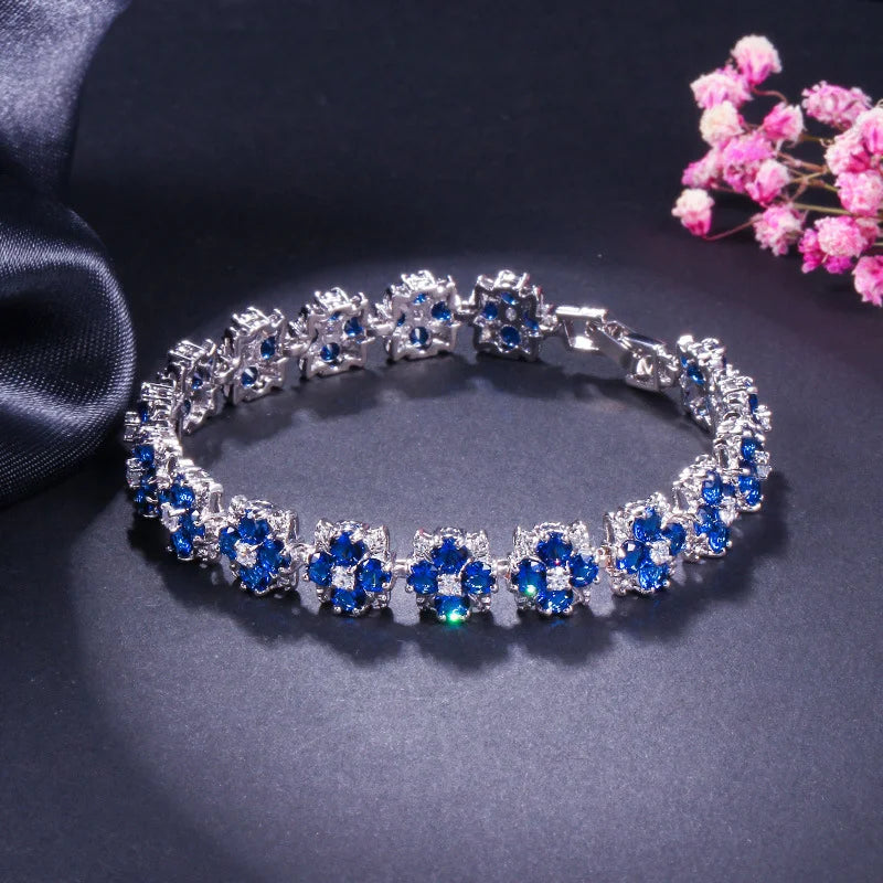 ThreeGraces Luxury Shiny Blue Zirconia Flower Tennis Bracelet for Women Fashion Bridal Wedding Evening Party Jewelry BR402