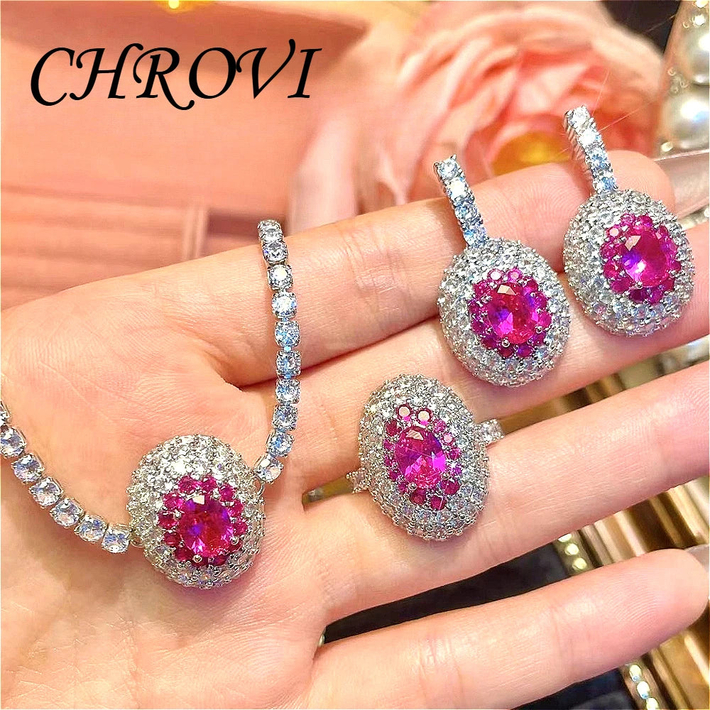 Exquisite 925 sterling silver diamond-studded necklace, stylish emerald diamond ring, earrings, and gemstone set.