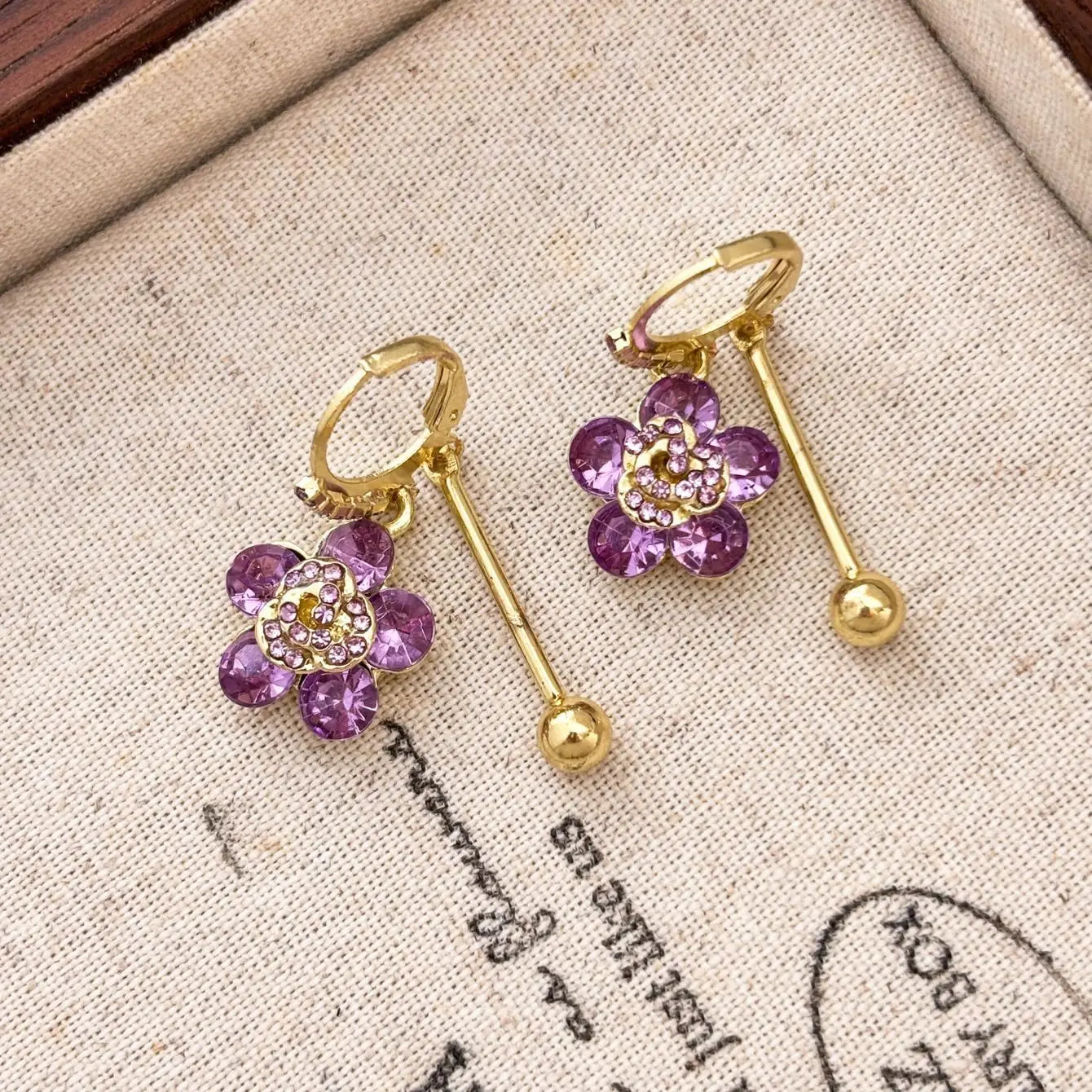 European and American fashion purple sparkling diamond flower design earrings with a sense of light luxury and high-end temperam