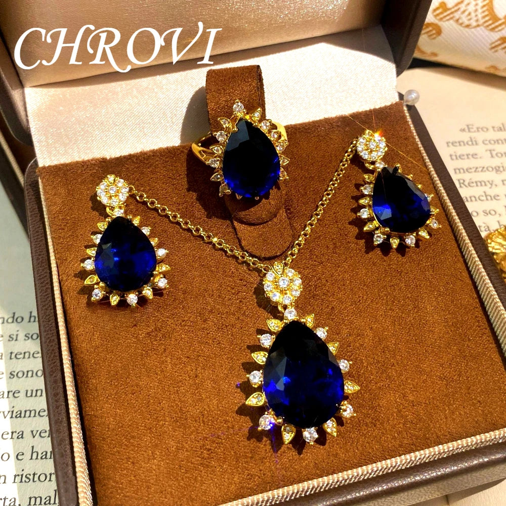 Fashionable and exquisite golden luxury gemstone drop-shaped pendant necklace, women's set including ring, earrings and pendant.