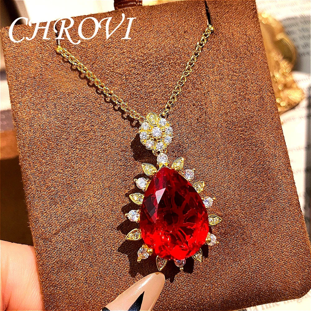 Fashionable and exquisite golden luxury gemstone drop-shaped pendant necklace, women's set including ring, earrings and pendant.