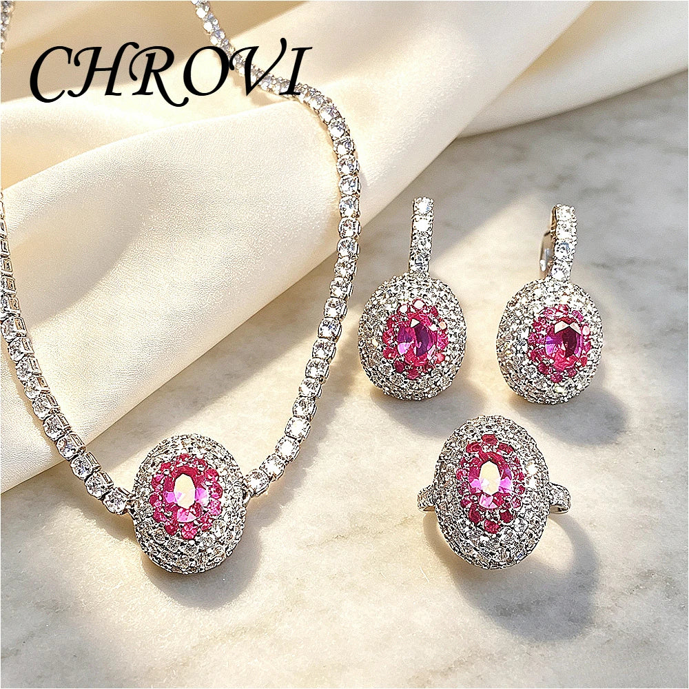 Exquisite 925 sterling silver diamond-studded necklace, stylish emerald diamond ring, earrings, and gemstone set.
