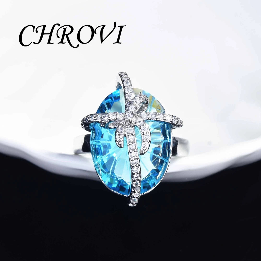 Luxury 925 sterling silver bow-shaped open ring. Exquisite candy-style aquamarine necklace with precious stones.