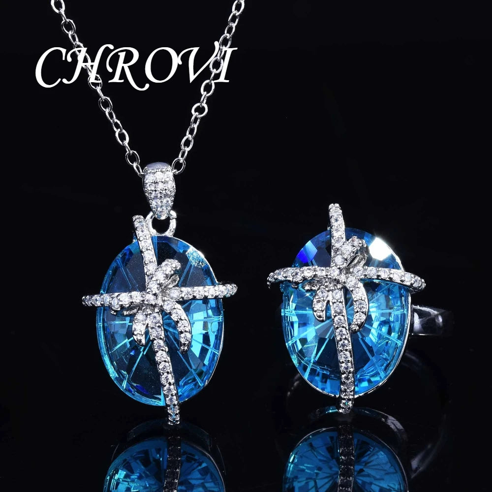 Luxury 925 sterling silver bow-shaped open ring. Exquisite candy-style aquamarine necklace with precious stones.