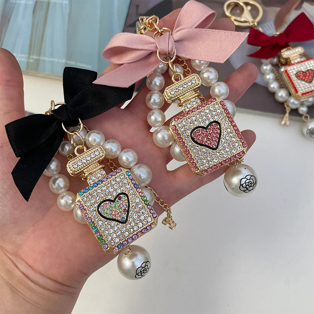 2024 New Luxury Crystal Love Perfume Bottle Keychain Pearl Bow Key Ring Eiffel Tower Women's Bag Pendant Souvenir Gift